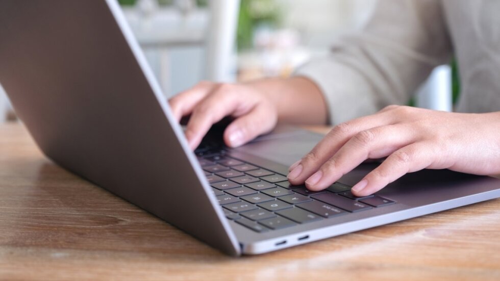 closeup-image-of-woman-s-hands-using-and-typing-on-2023-11-27-05-08-08-utc.jpg